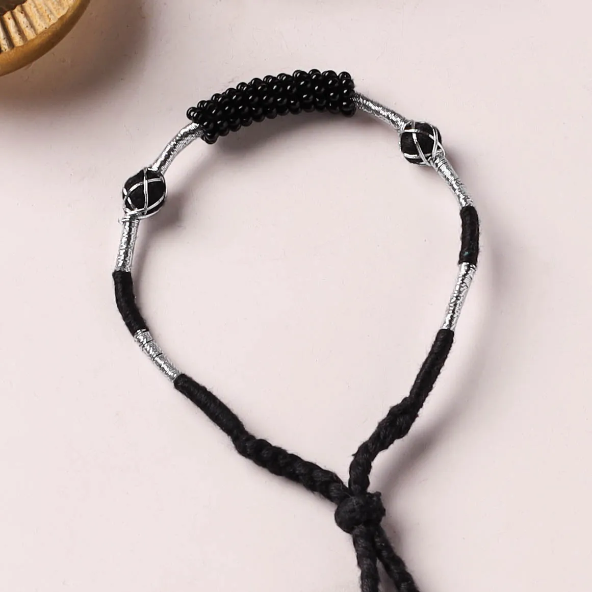 Anant Raksha Thread & Bead Work Lumba Rakhi / Bracelet with Potli 17 sold by Itokri product image thumbnail 2