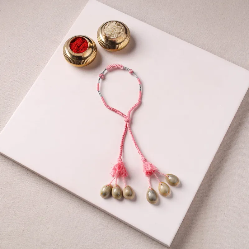 Anant Raksha Thread & Bead Work Lumba Rakhi / Bracelet with Potli 02 made by Itokri