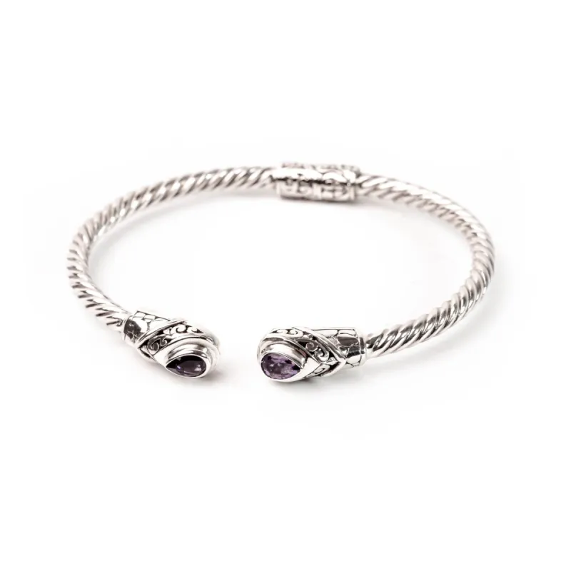 Tejakula Carving Purple Stone sold by Love Anchor