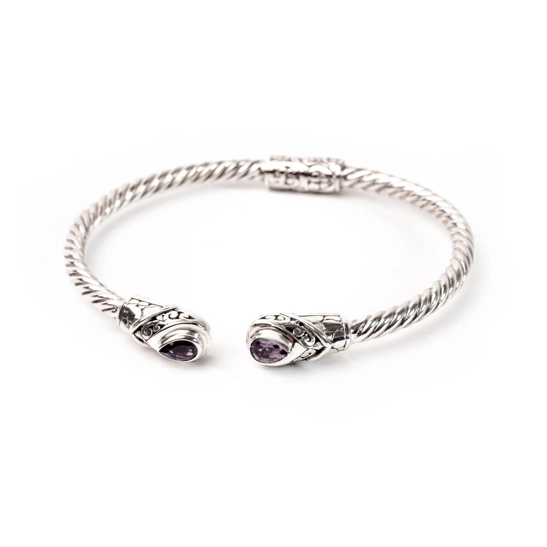 Tejakula Carving Purple Stone sold by Love Anchor