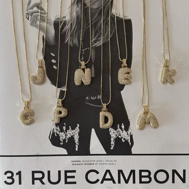 INITIAL NECKLACE sold by Elvn Elvn