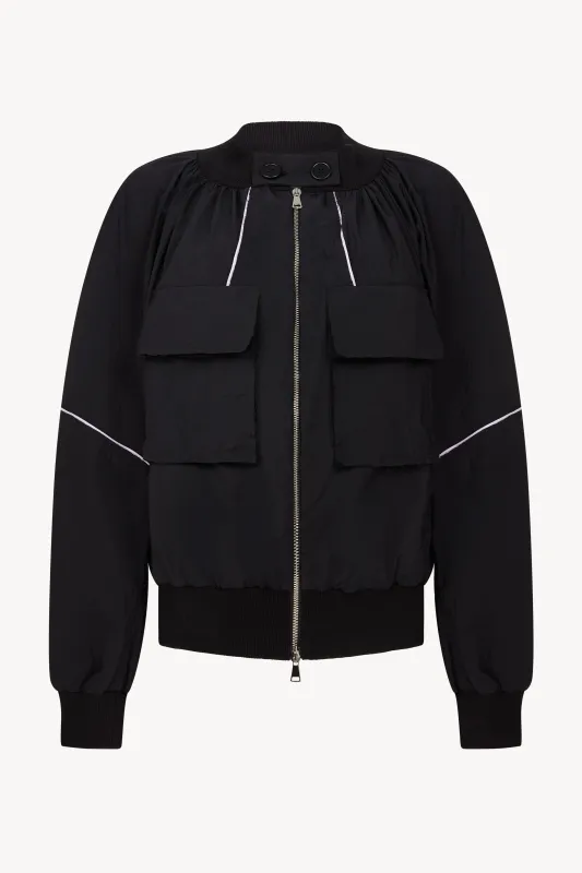 Black and Lilac Bomber Jacket sold by Talia Byre