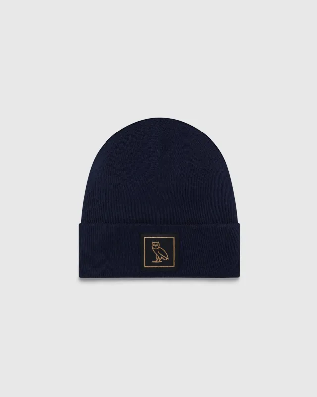 BADGE WOOL BEANIE - NAVY sold by OVO