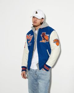NBA NEW YORK KNICKS VARSITY JACKET - BLUE sold by OVO