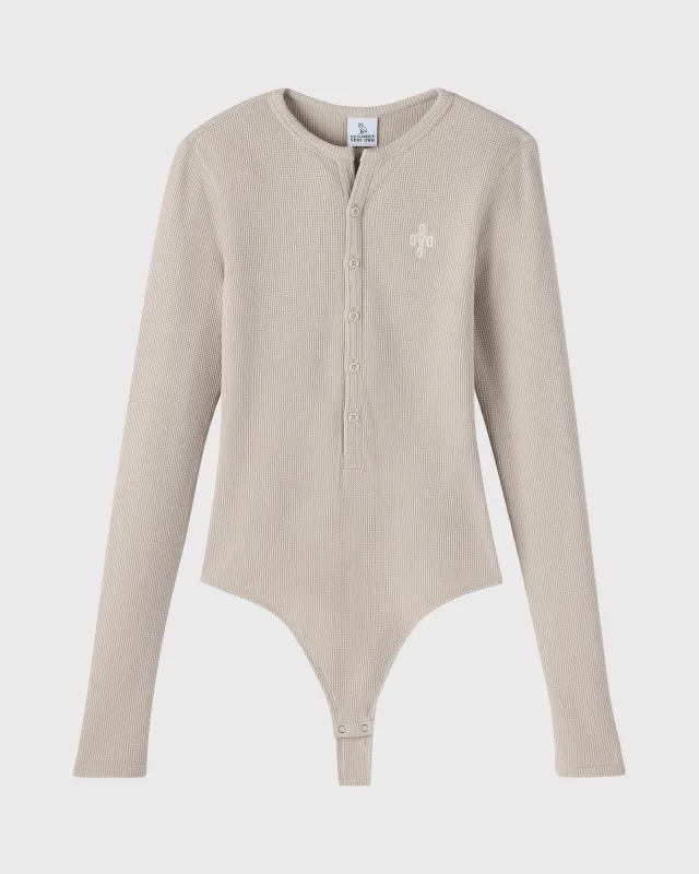 Pom Pom Henley Bodysuit sold by OVO