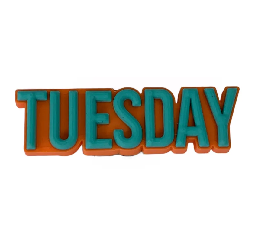 Crocs Jibbitz Tuesday Charm sold by The Foot Factory