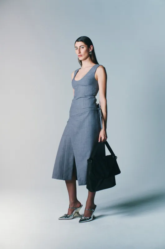 SLICE PLEAT MIDI SKIRT sold by Mode Mischief