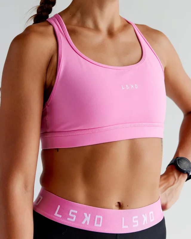Extend Sports Bra - Spark Pink sold by LSKD