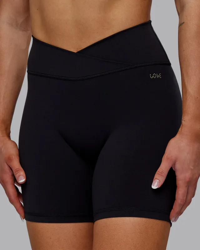Sara Strike Cross Over Waist Mid Short Tights - Black sold by LSKD