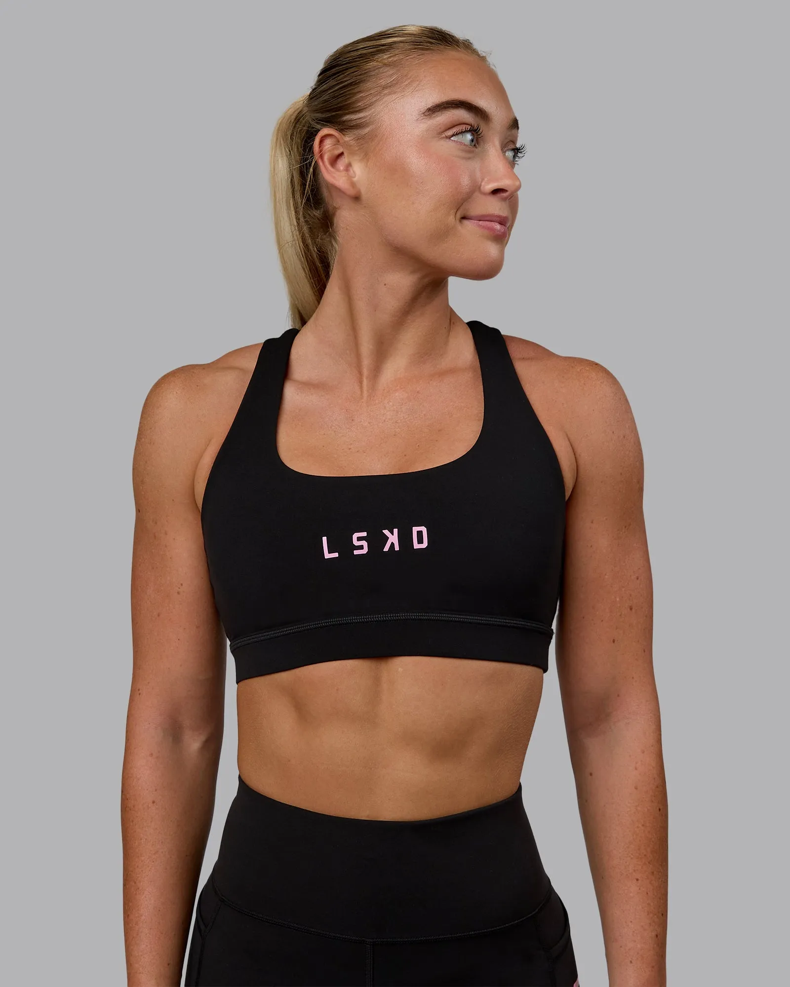 Rep Sports Bra - Black-Bubblegum sold by LSKD