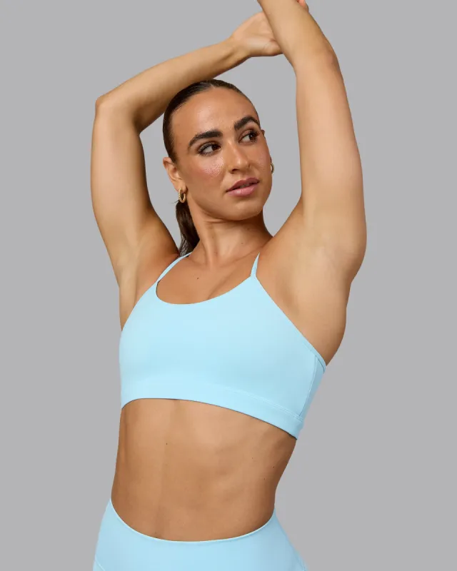 Glow Sports Bra - Crystal  Blue sold by LSKD