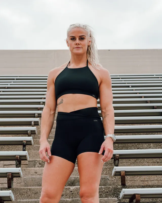 Sara Strike Ultra High-Rise Cross Over Waist 4" Short - Black sold by LSKD