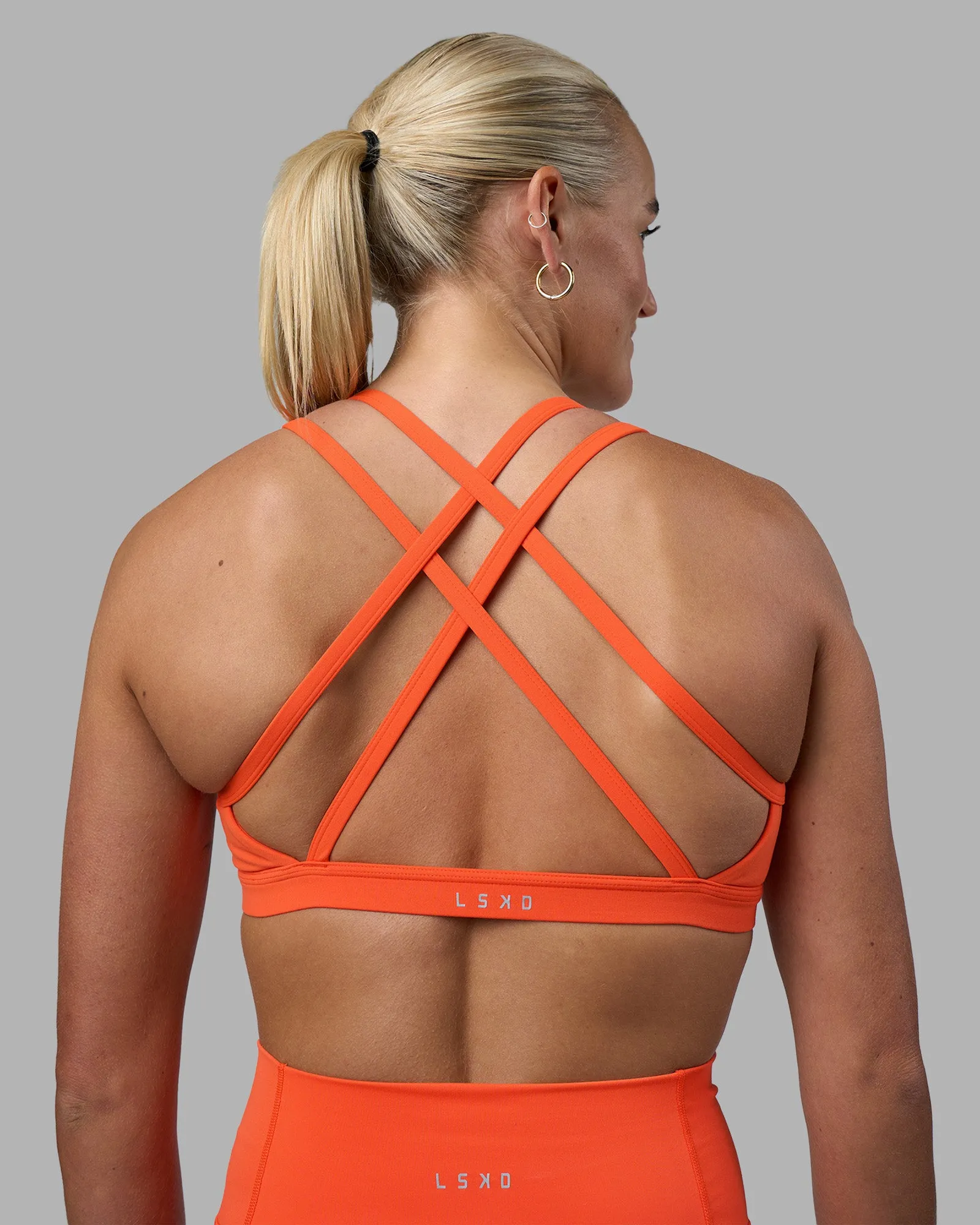 Velocity Sports Bra - Ultra Orange sold by LSKD