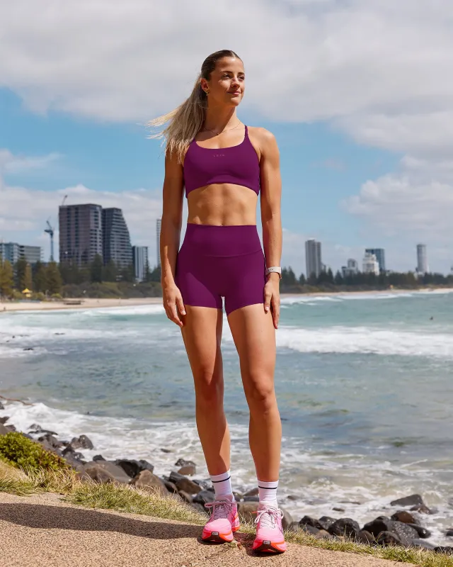 Elixir Defined High-Rise 4" Short - Plum Caspia sold by LSKD