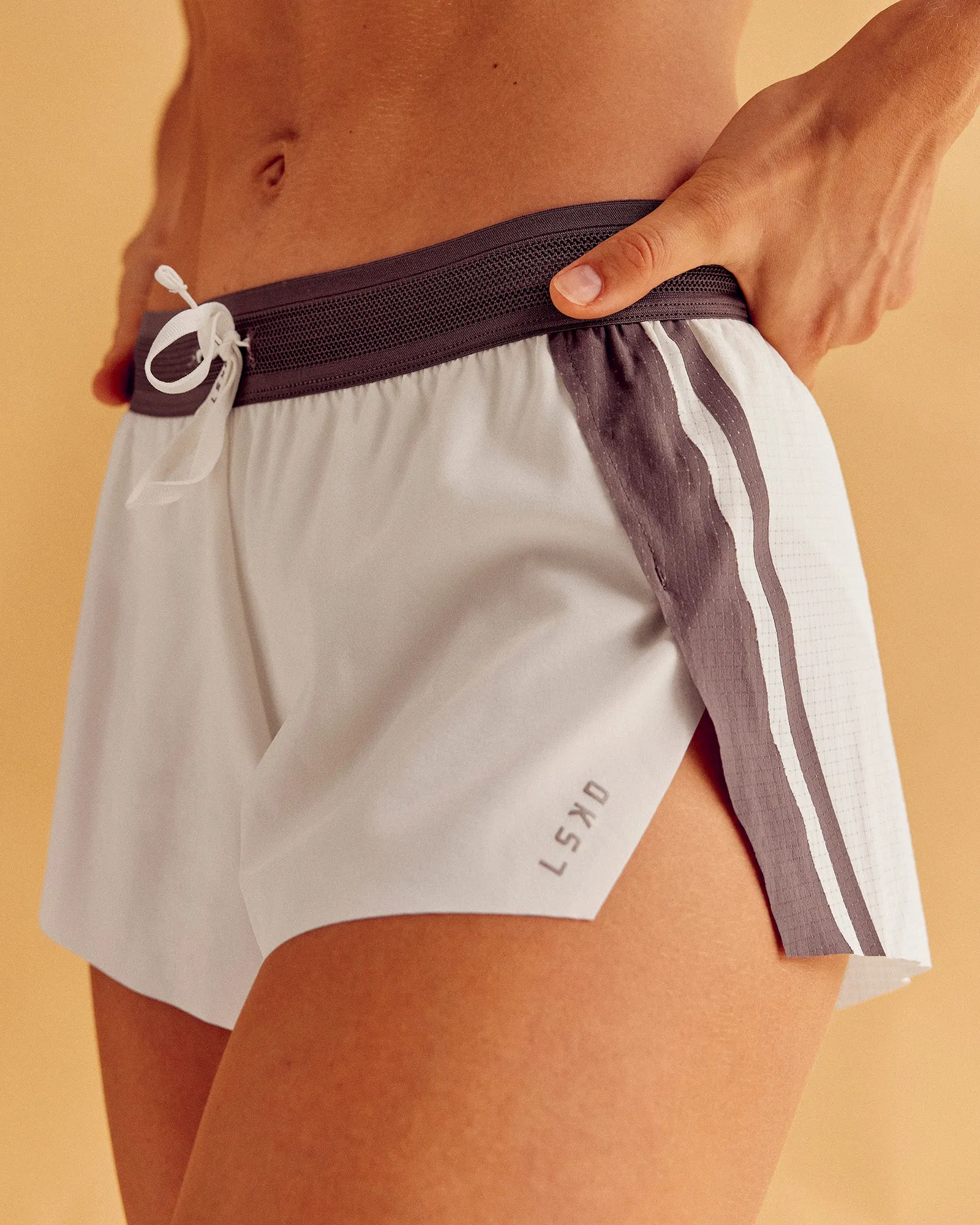 Accelerate 3" Force Mid-Rise Running Short - Cocoa powder-Off White sold by LSKD
