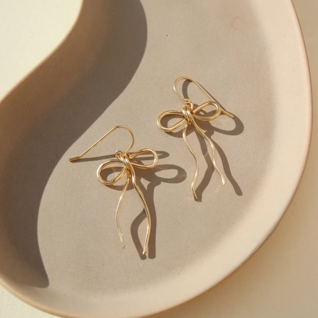 Token Jewelry | Coquette Bow Earrings - 14k Gold Fill sold by Fort
