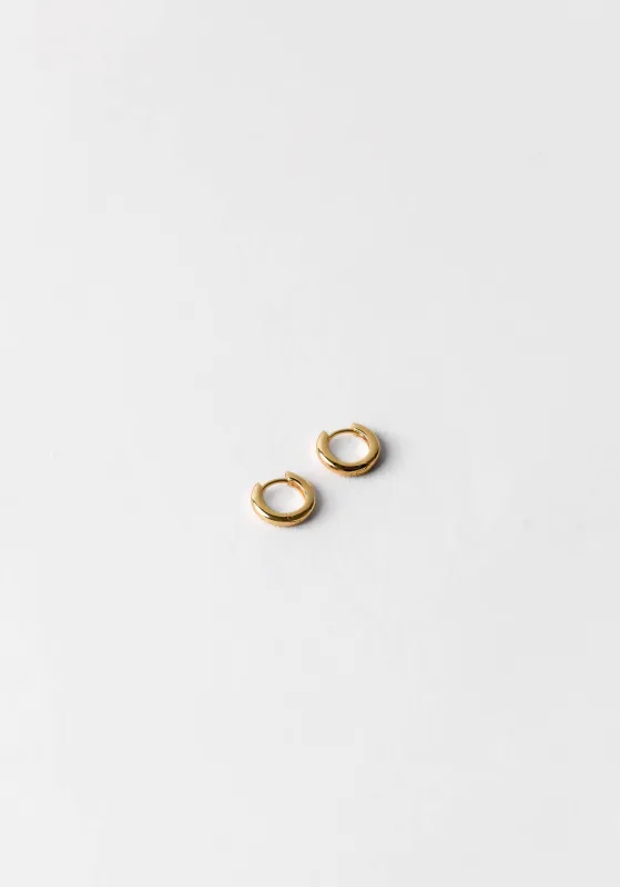 Wolf Circus | Huggie Hoops in Gold sold by Fort