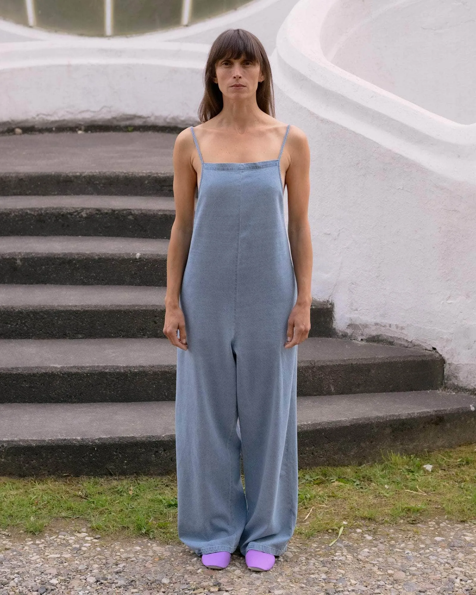 Baserange | Yumi Jumpsuit - Light Denim Wash sold by Fort