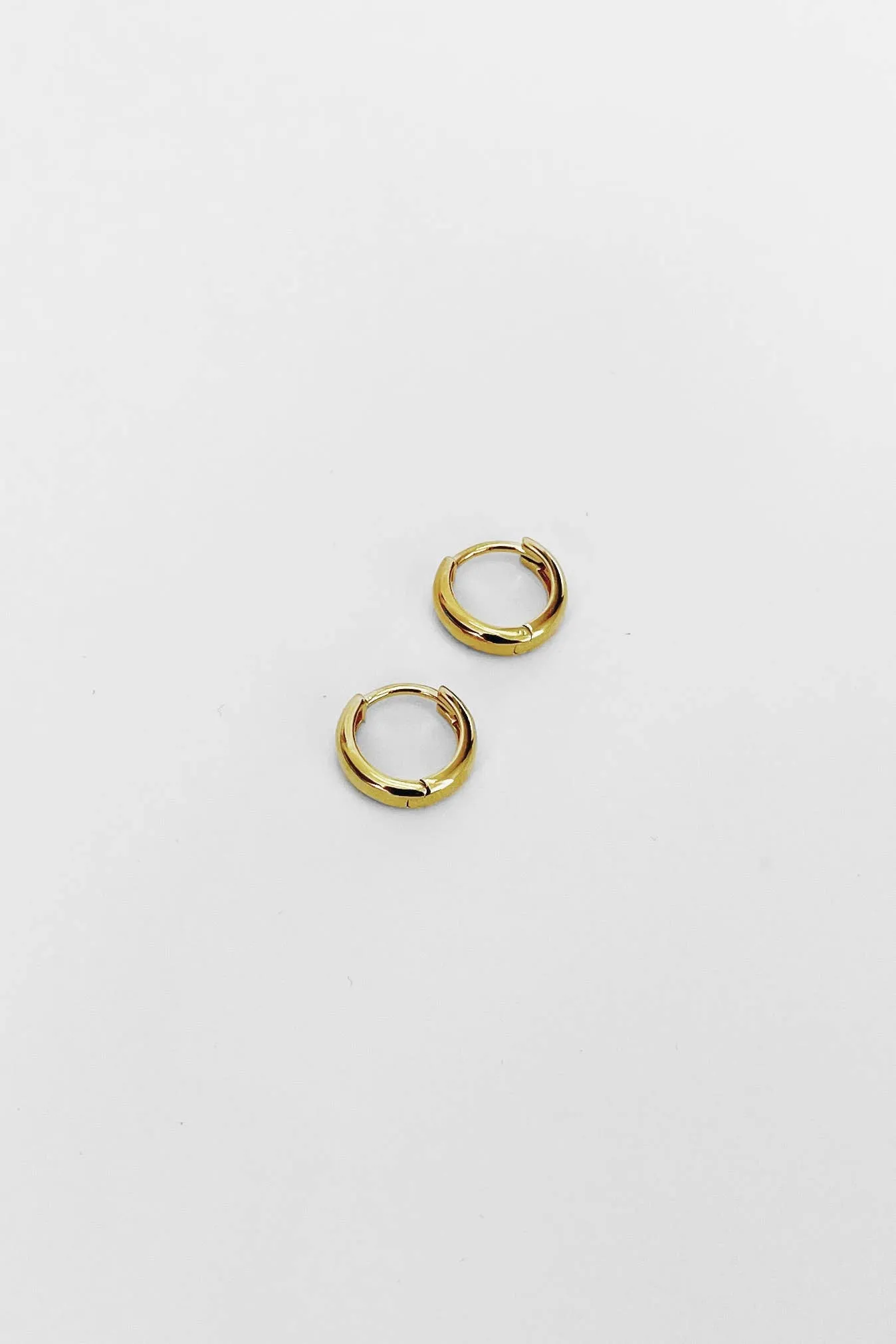 Kara Yoo | Norma Huggie Hoops - Gold Vermeil sold by Fort