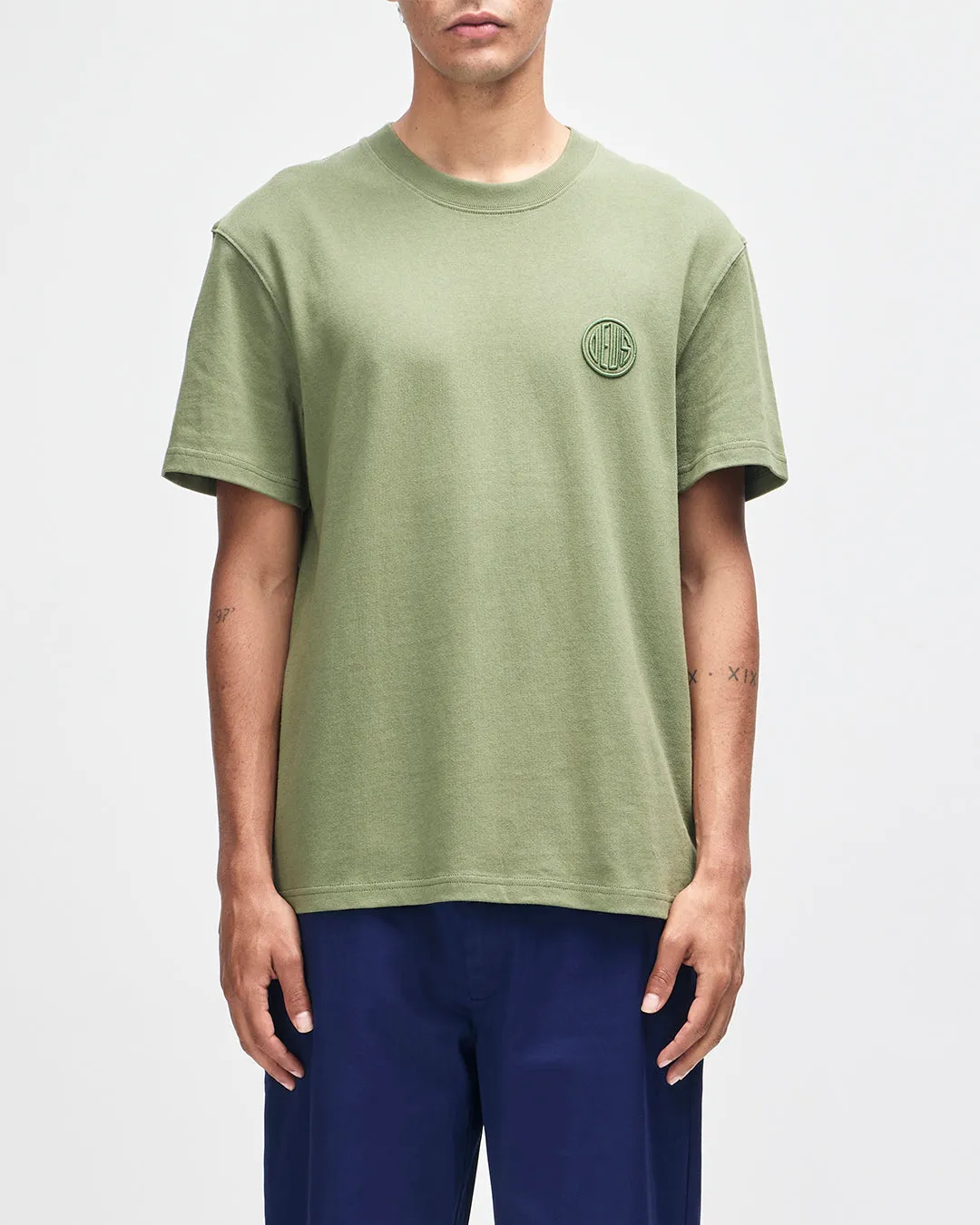 Pill Logo Tee - Pine Green sold by Deus Ex Machina