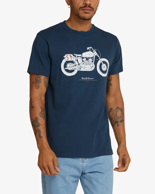 The Kr Tee - Navy sold by Deus Ex Machina