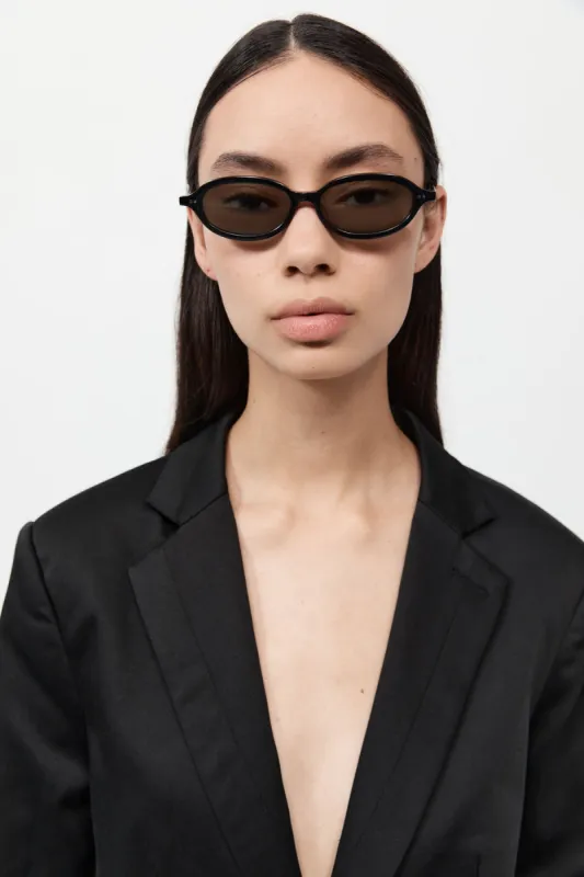 90s Slim Oval Sunglasses - Black sold by St. Agni