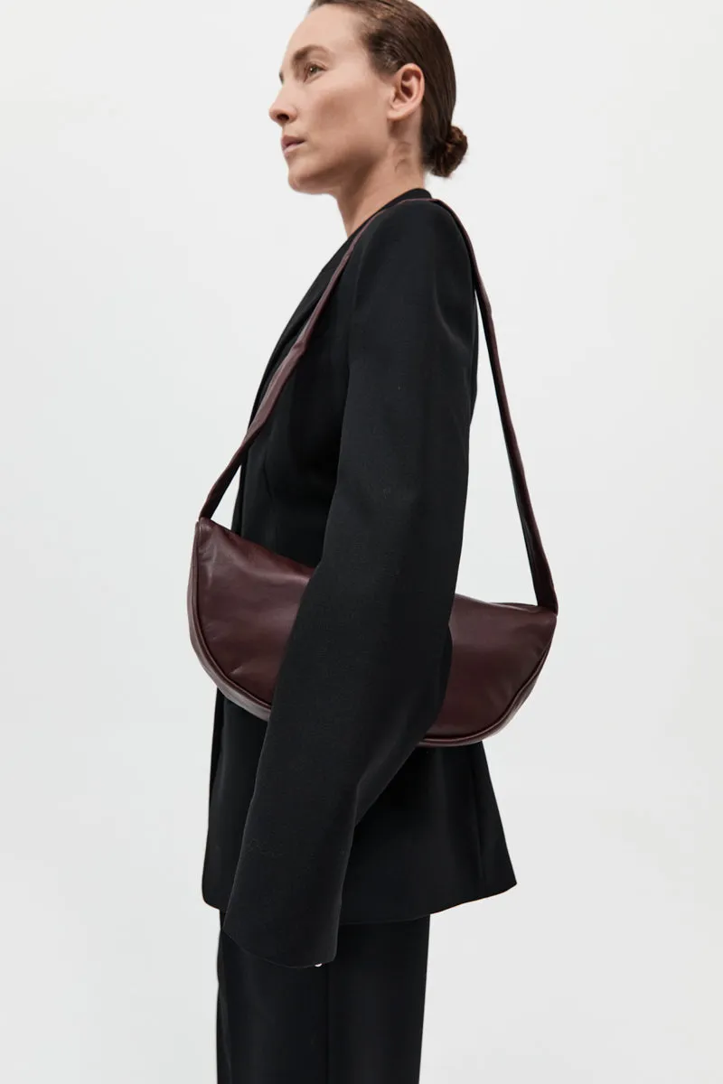 Soft Crescent Bag - Plum sold by St. Agni