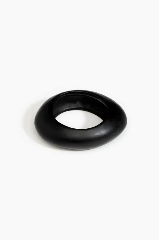 Medium Rock Bangle by Dinosaur Designs - Black sold by St. Agni