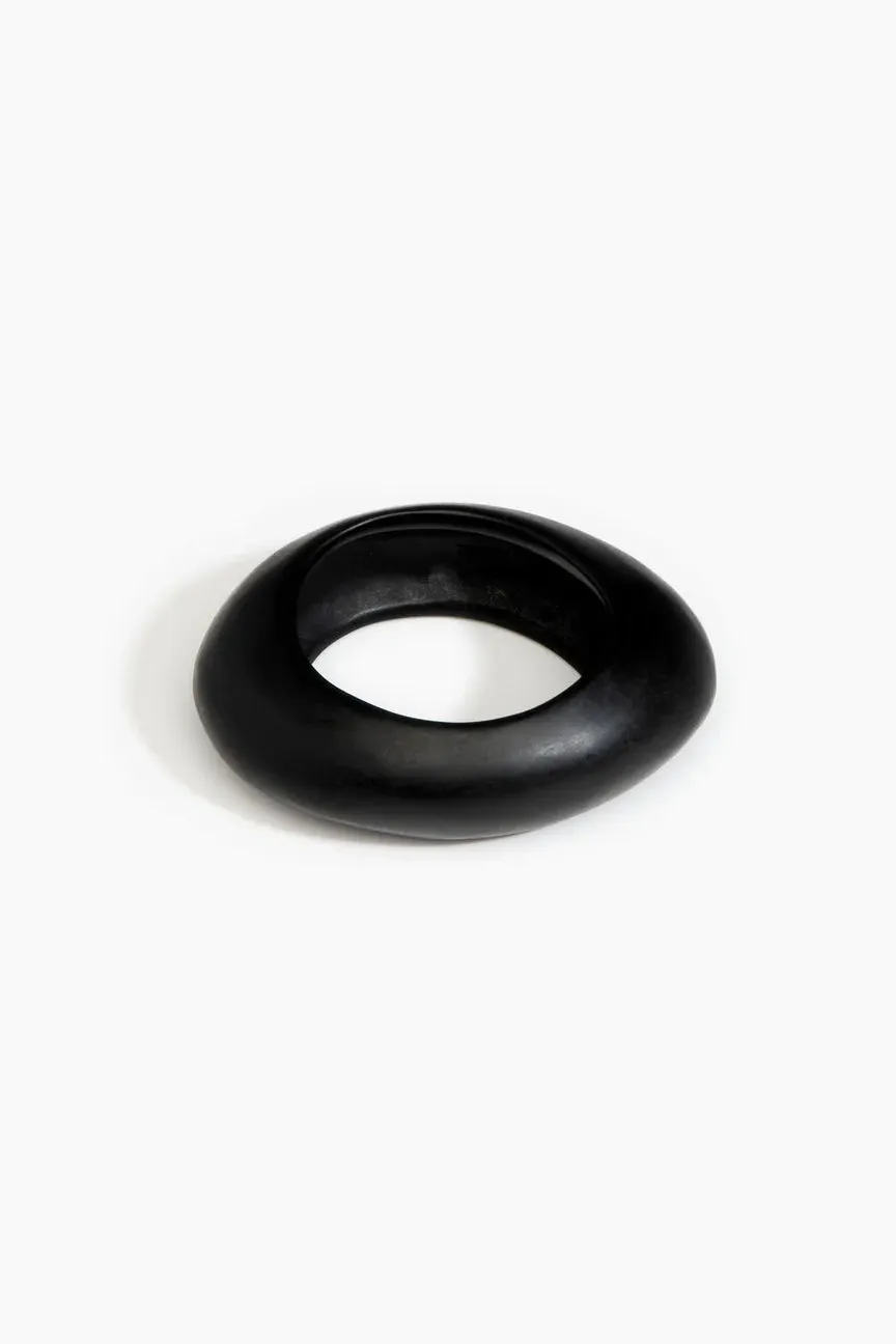 Medium Rock Bangle by Dinosaur Designs - Black sold by St. Agni