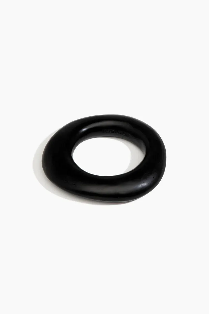 Medium Drift Bangle by Dinosaur Designs - Black sold by St. Agni