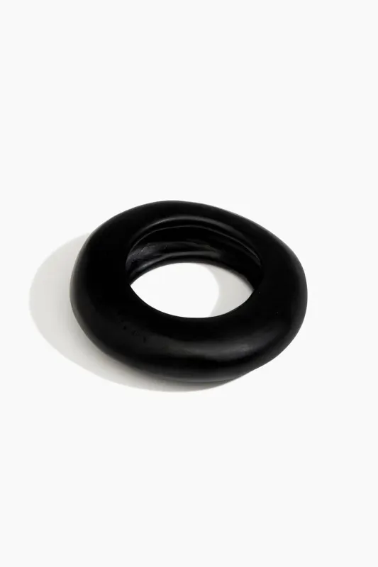 Large Drift Bangle by Dinosaur Designs - Black sold by St. Agni