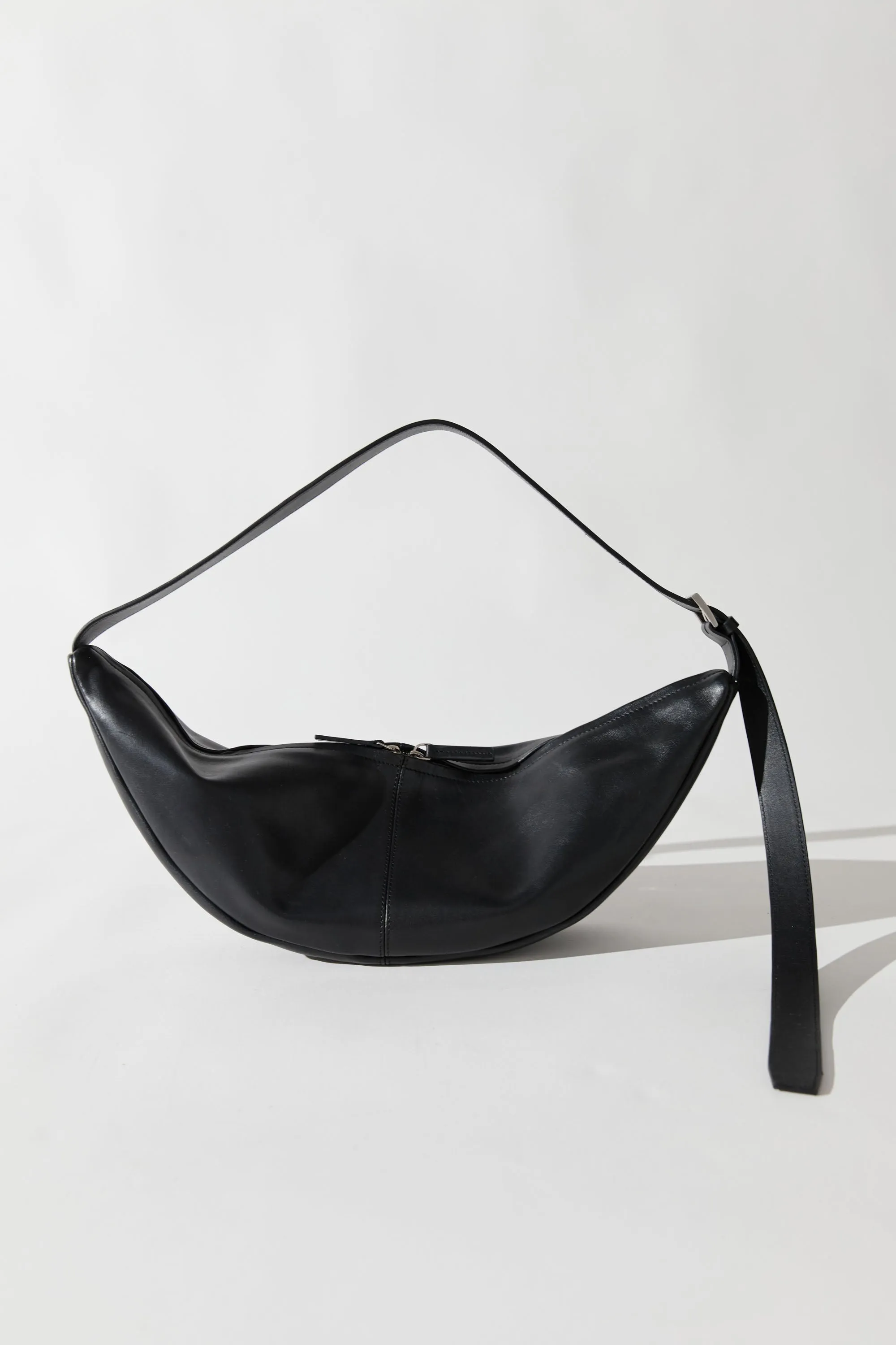 Adjustable Slim Crescent Bag - Black sold by St. Agni