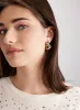 Twist Hoop Earrings sold by Laura