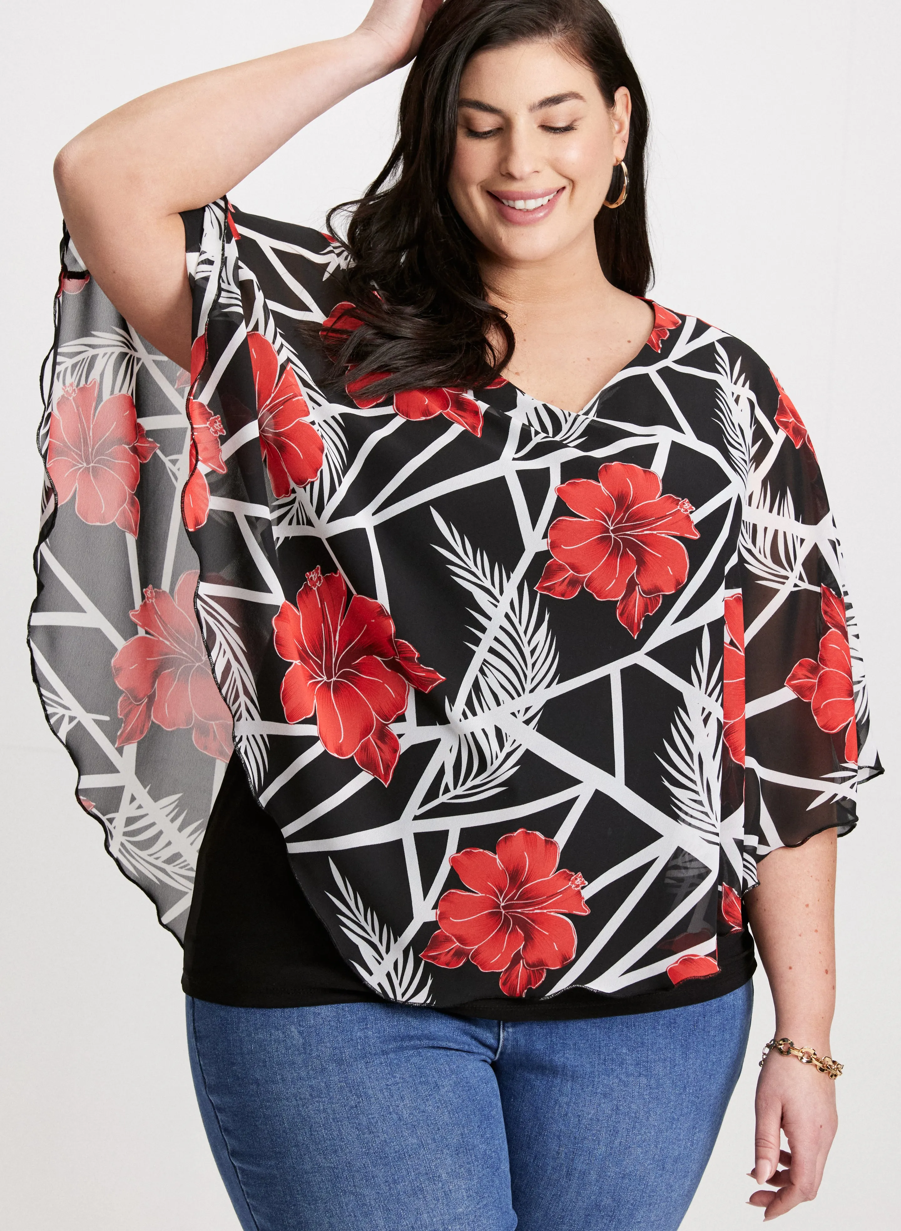 3/4 Sleeve Floral Poncho Blouse sold by Laura