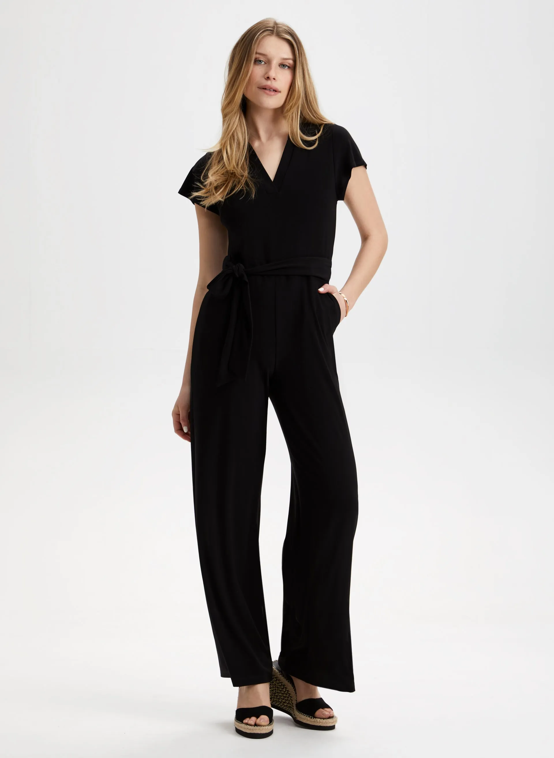 Wide Leg V-Neck Jumpsuit sold by Laura