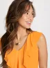 Ruffled Sleeveless Top sold by Laura