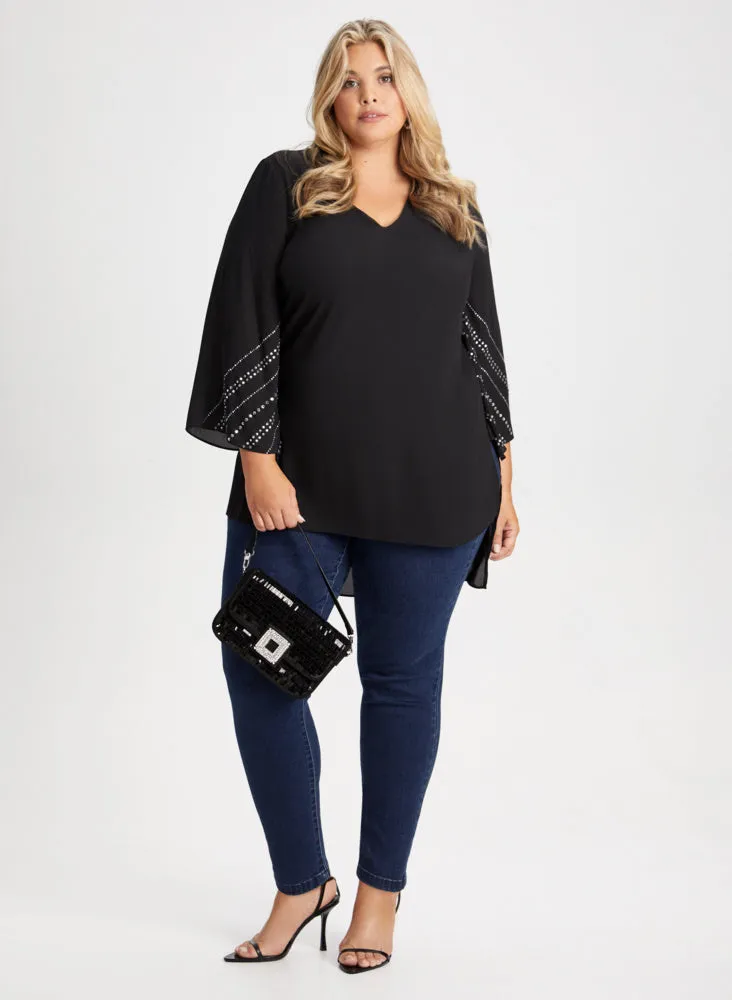 Rhinestone Detail Tunic & Slim Leg Jeans sold by Laura