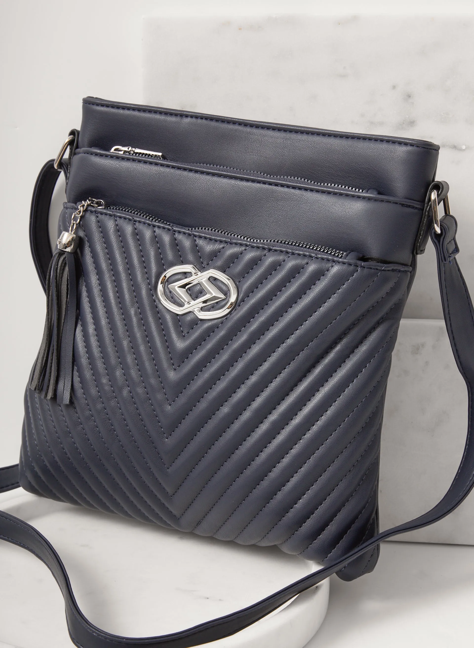 Quilted Crossbody Bag sold by Laura