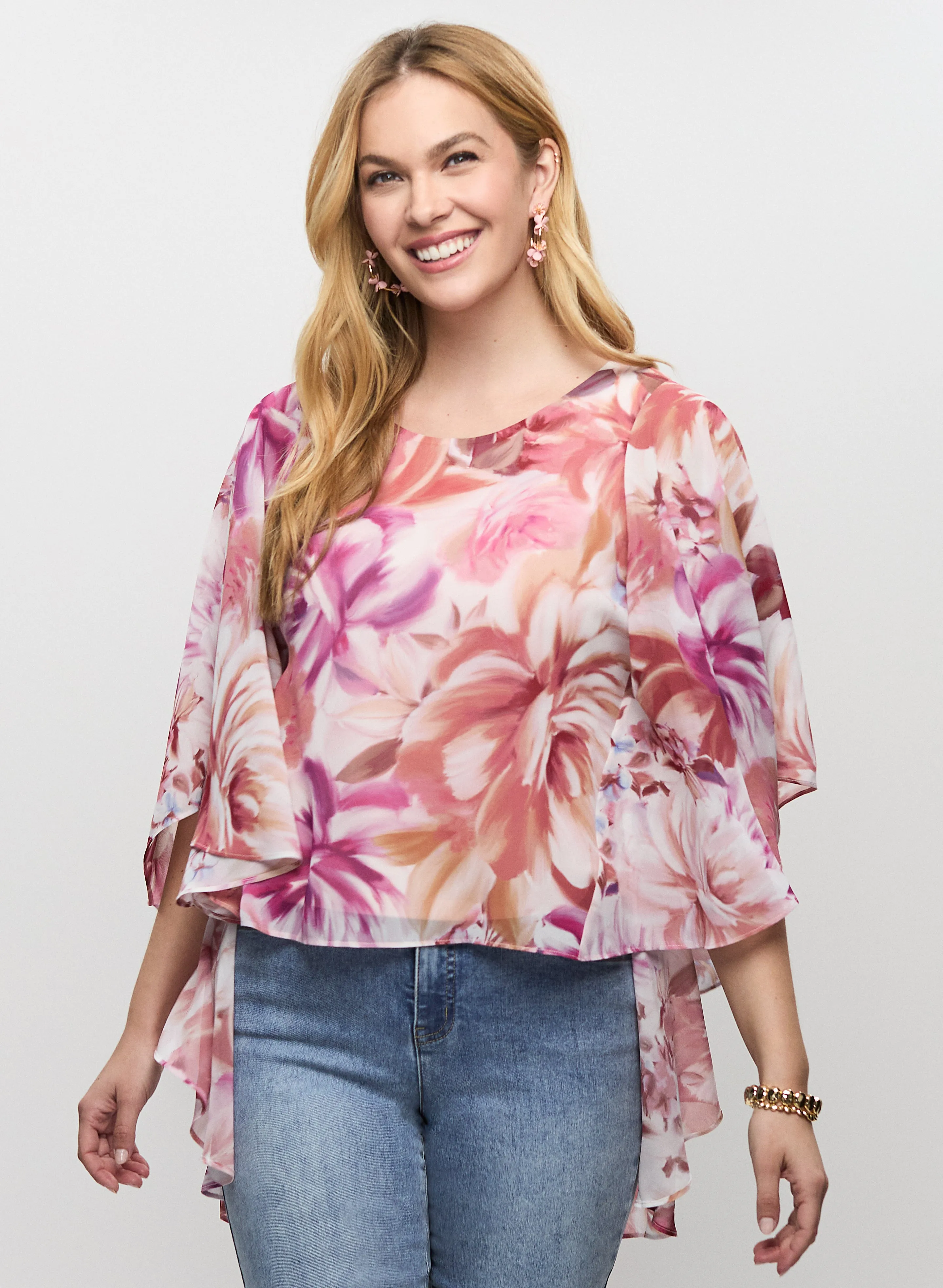 Flared Sleeve Floral Blouse sold by Laura