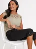 Button & Tab Hem Denim Capris sold by Laura