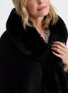 Twist Detail Faux Fur Poncho sold by Laura