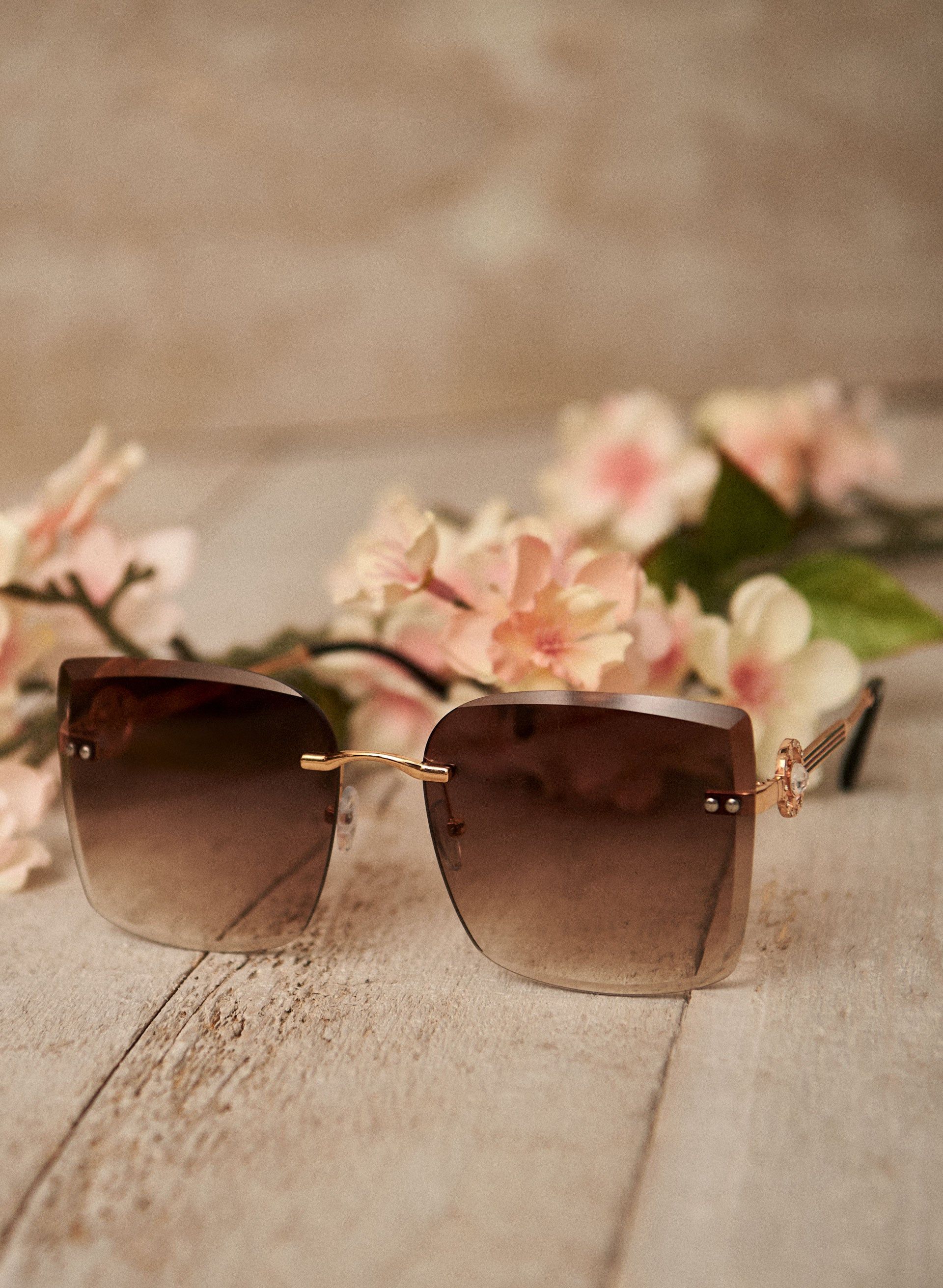 Rimless Crystal Detail Sunglasses sold by Laura