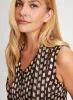 Geometric Print Sleeveless Blouse sold by Laura
