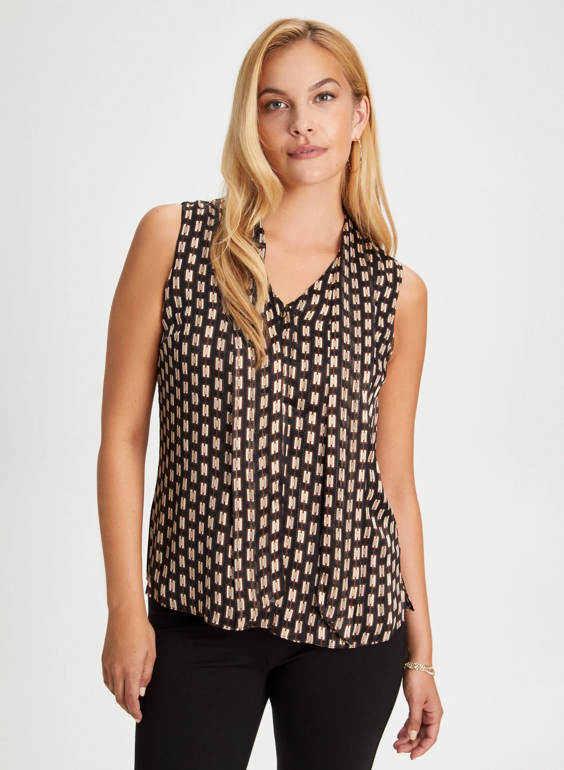 Geometric Print Sleeveless Blouse sold by Laura