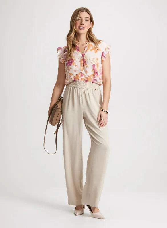 Floral Ruffled Blouse & Wide Leg Cargo Pants sold by Laura