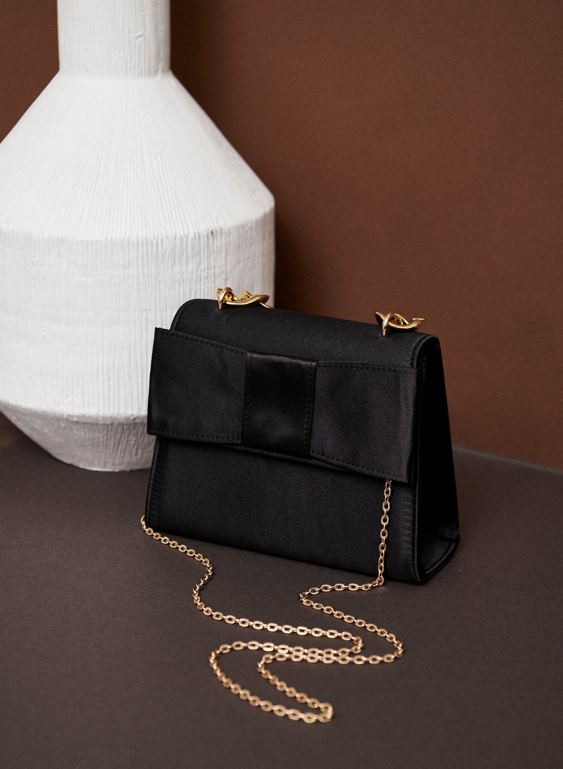 Chain Strap Clutch sold by Laura