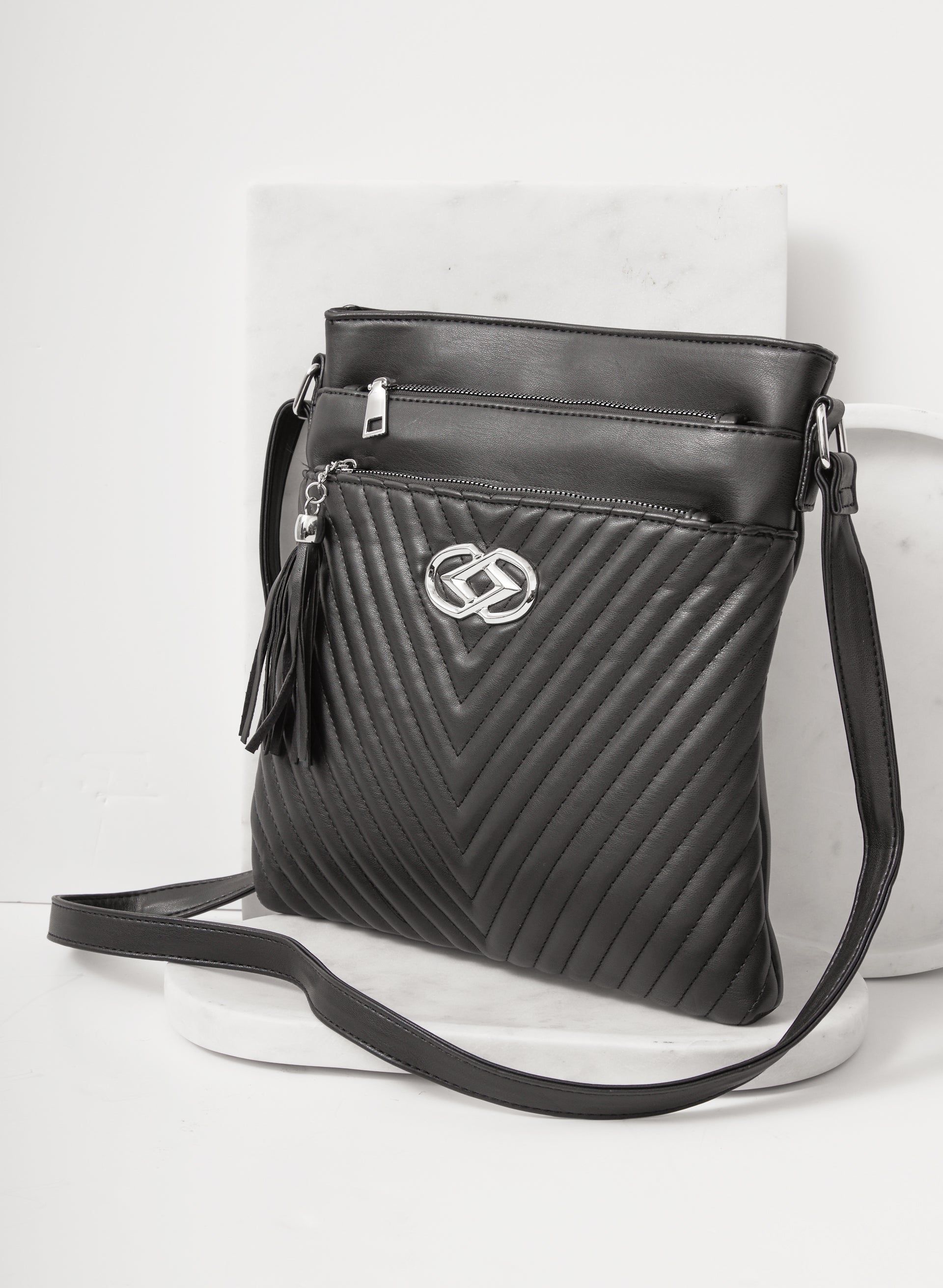 Quilted Crossbody Bag sold by Laura