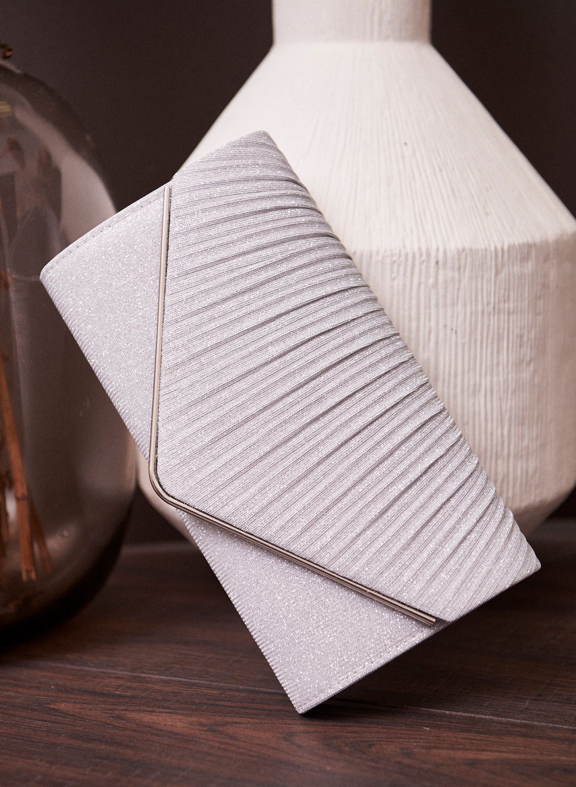 Shimmer Envelope Clutch sold by Laura