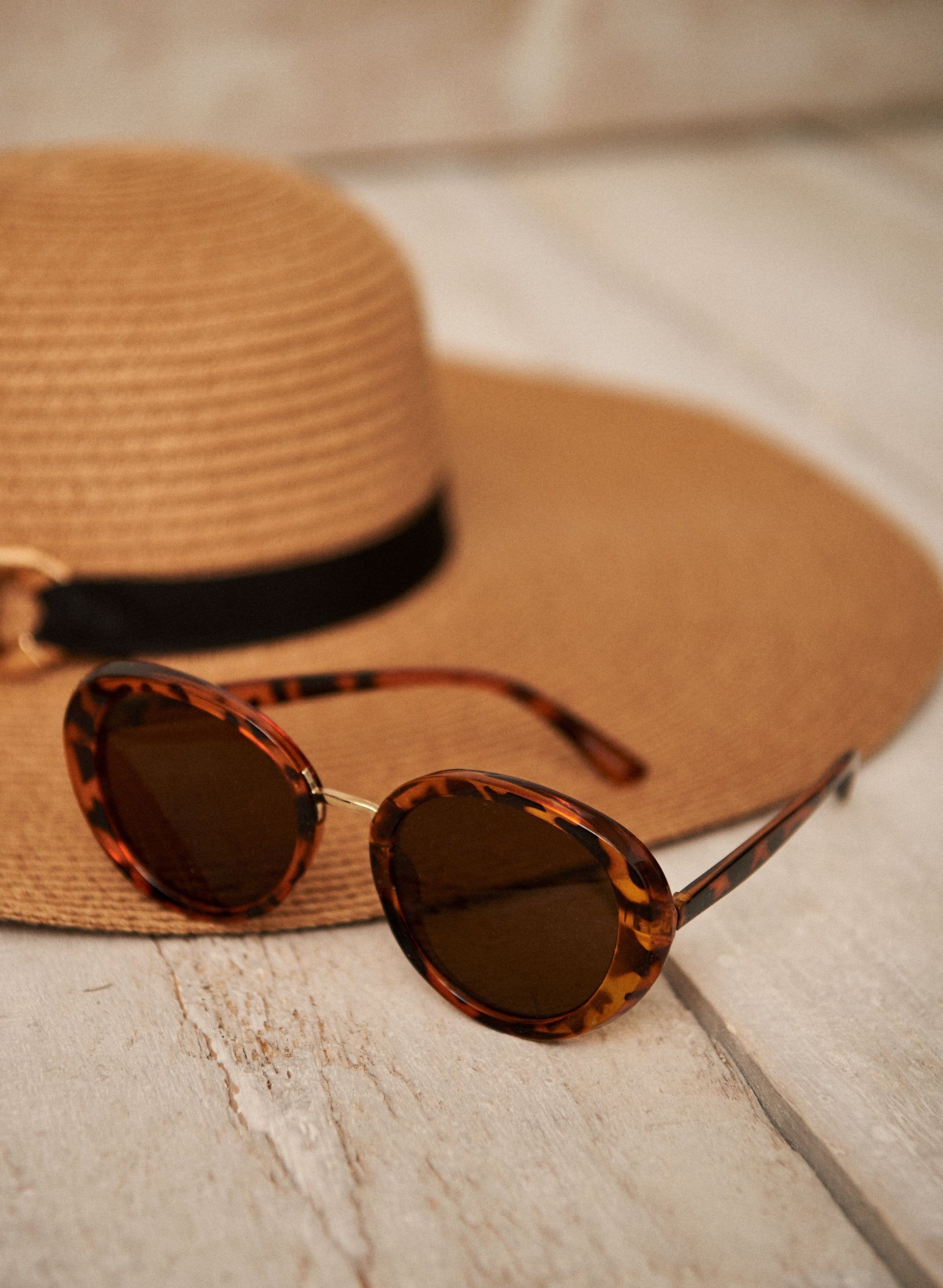 Tortoise Shell Sunglasses sold by Laura