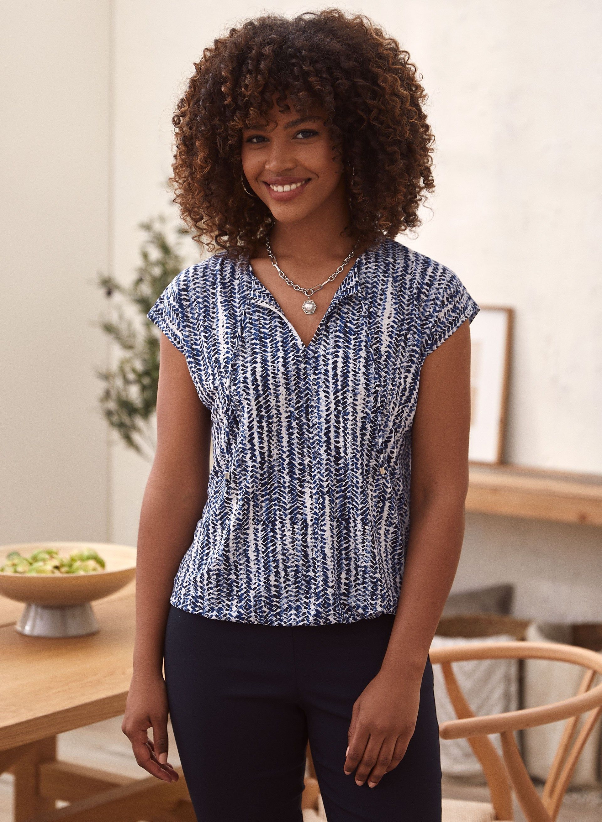 Printed Open V-Neck Top sold by Laura